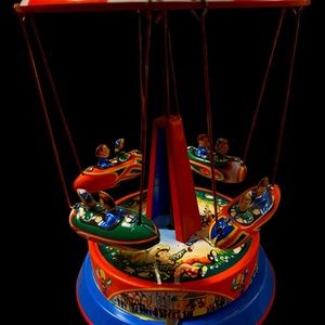 Vintage Blomer- Schuyler Tin Litho Spin Carnival Rocket Ride.  Made in W Germany